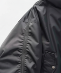 Bomber jacket sleeve detail without zipper pull