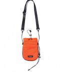 Full view of orange crossbody bag