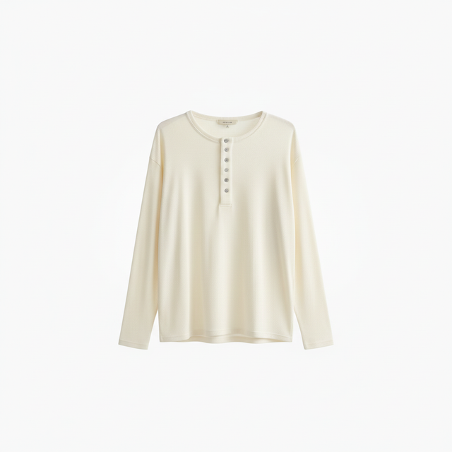 Wrinkle-free cream henley floating on white backdrop